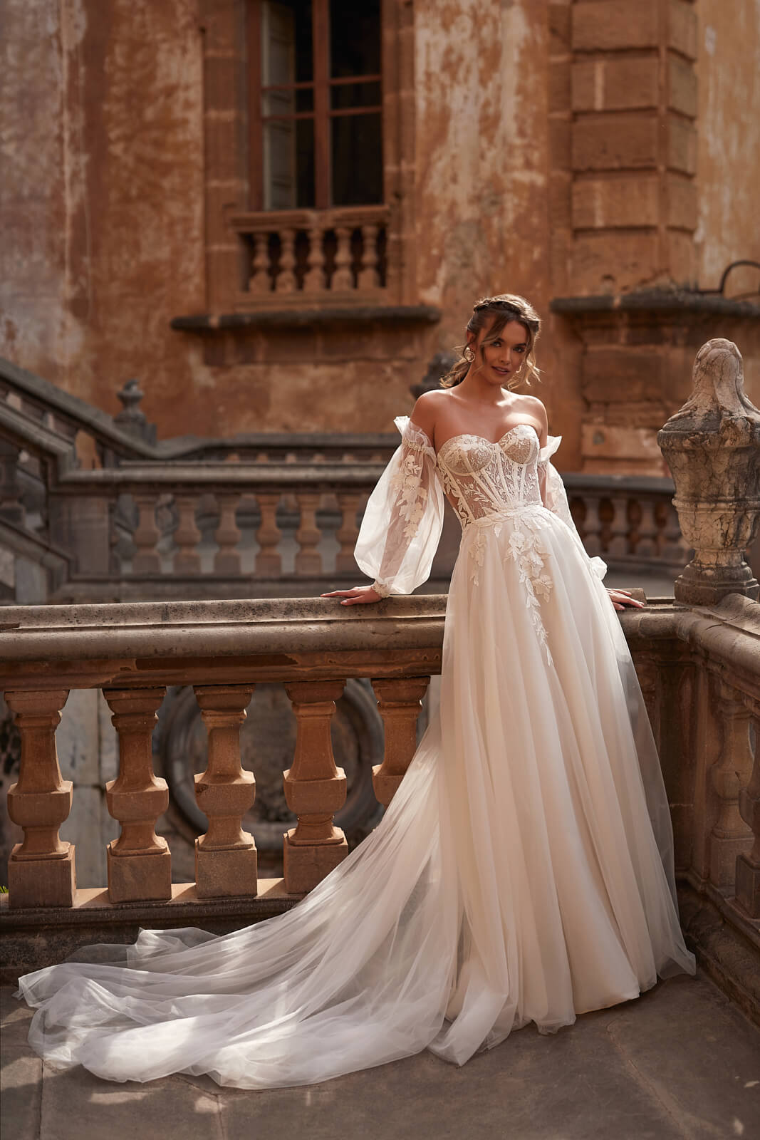 Wedding dress Hermiona – A-line wedding dress with long sleeves by DAMA Couture.