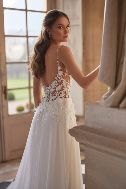 Agapia wedding dress – a floral lace bodice, slender straps and airy chiffon skirt, DAMA Couture Something Blue 2027.