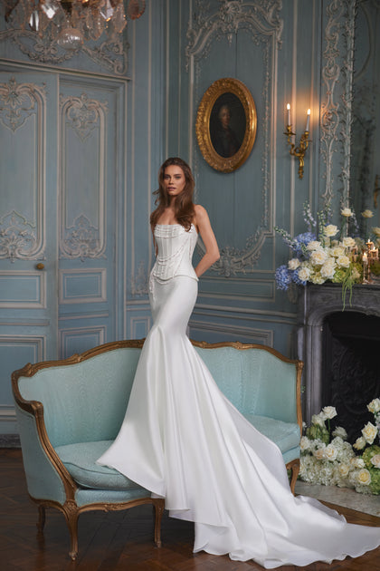 Armance wedding dress from the Something Blue 2027 collection – a corset bodice draped with strands of pearls.