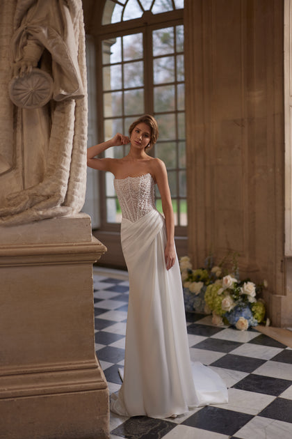 Greta wedding dress – mermaid bridal gown with a richly beaded strapless corset and draped satin skirt.