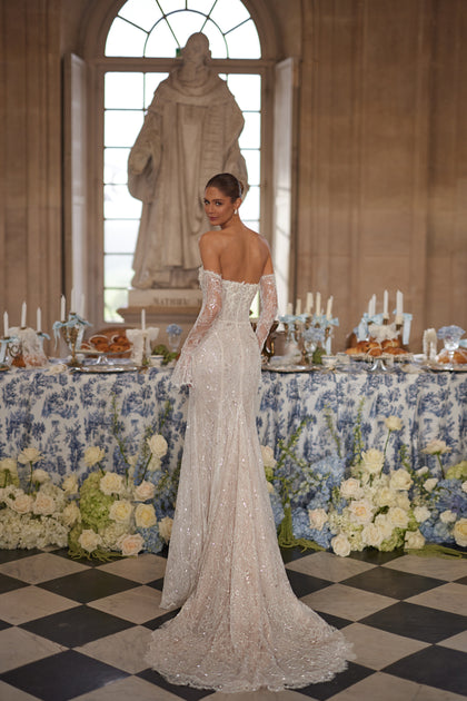 Irulian wedding dress – a strapless shimmering bodice and fitted lace silhouette, DAMA Couture Something Blue 2027.