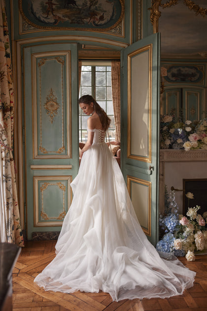 Nerina wedding dress – bridal gown with jewellery-like detailing and off-the-shoulder tulle straps, DAMA Couture.