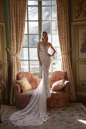 Ondine wedding dress – mermaid bridal gown with a plunging V-neckline and deep illusion scoop back.