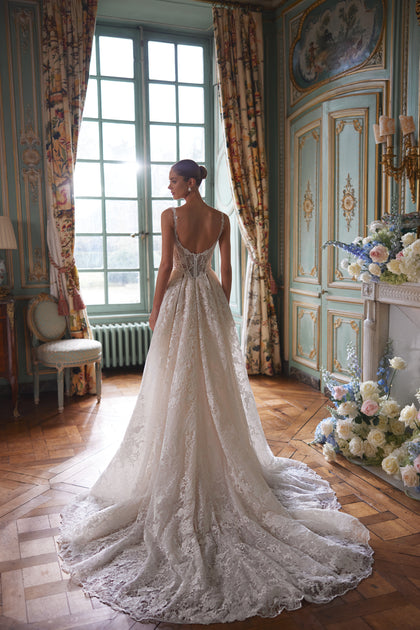 Thetis wedding dress – sheer corsetry, lace straps and an opulent lace skirt, from the Something Blue 2027 bridal collection.