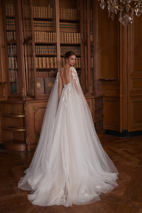 Veloria wedding dress – A-line bridal gown with a V-neckline, floral straps and layered tulle skirt.