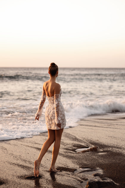 Das Brautkleid Kayla mit detailreicher 3D-Spitze und figurbetontem Mieder vereint Romantik und Eleganz.