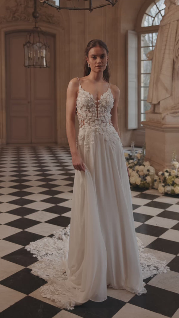 Video of the Agapia wedding dress in motion – A-line silhouette with a floral lace bodice, slender straps and airy chiffon skirt.
