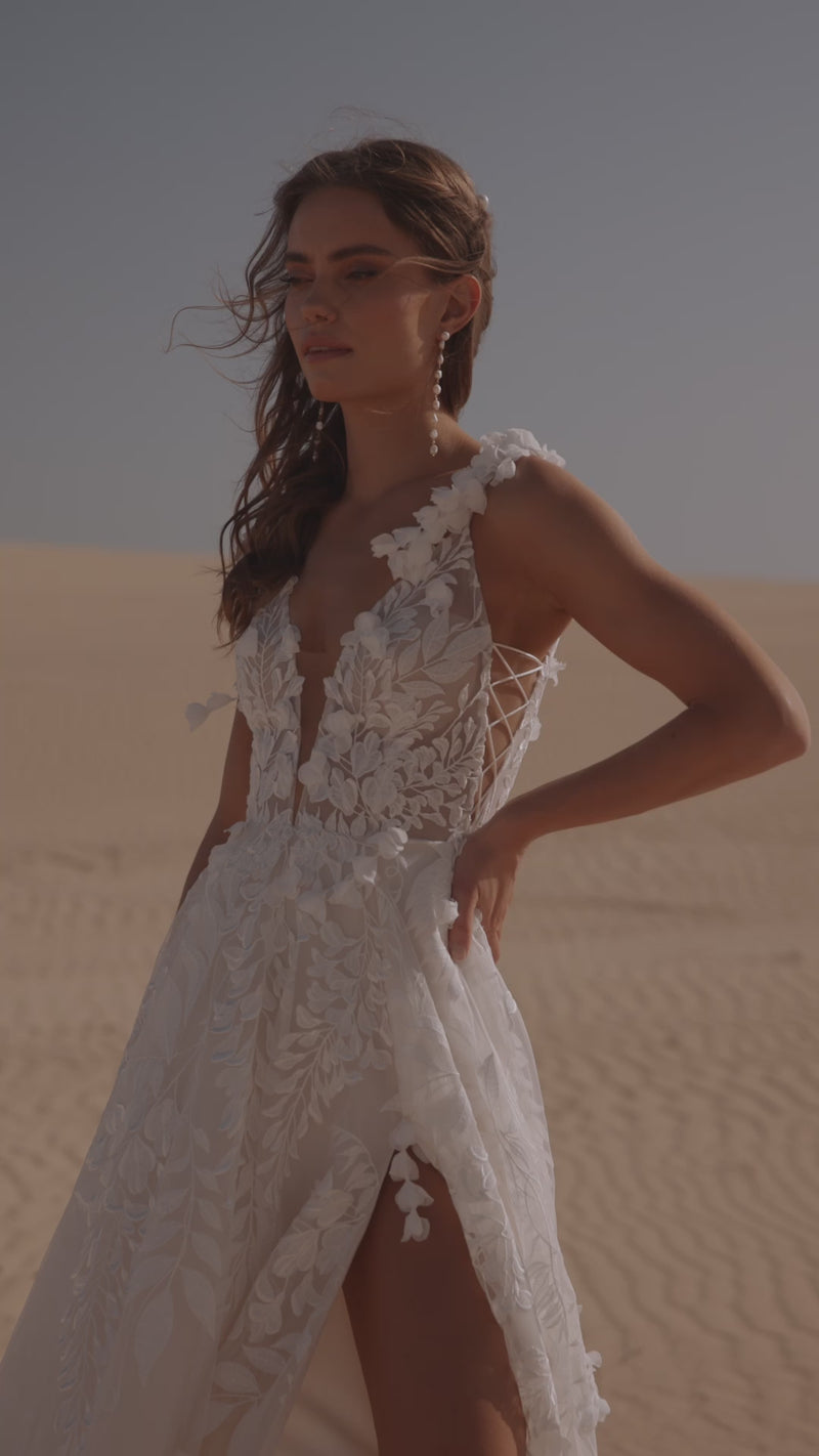 Video of the Wisteria wedding dress by DAMA Couture.