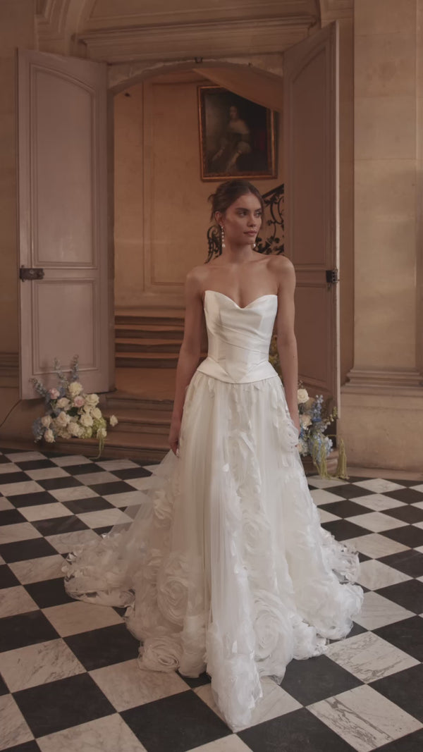 Video of the Cornellia corset + skirt in motion – A-line silhouette with an asymmetrically draped corset and voluminous layered skirt.