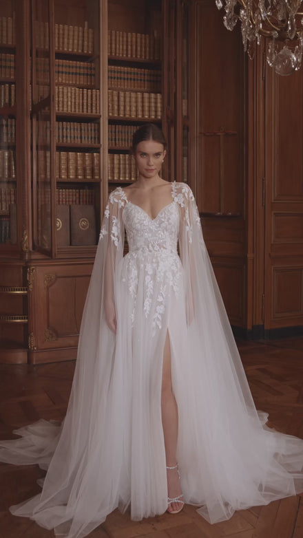 Video of the Veloria wedding dress in motion – A-line silhouette with a V-neckline, floral straps and layered tulle skirt.