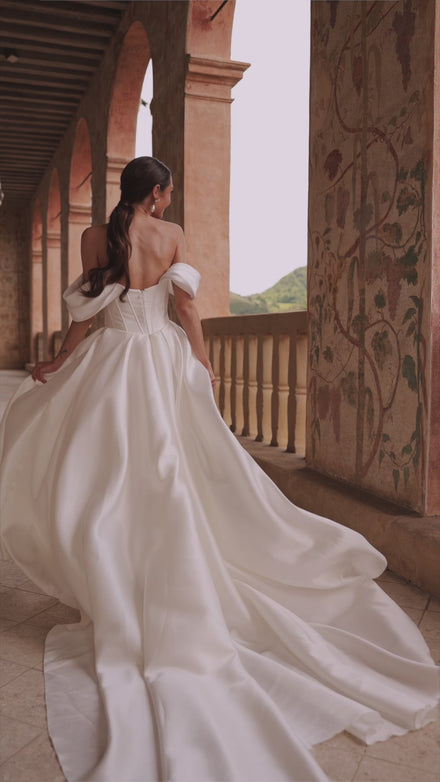 Classic simple wedding dress with falling sleeves Thalia from DAMA Couture (secondary video)