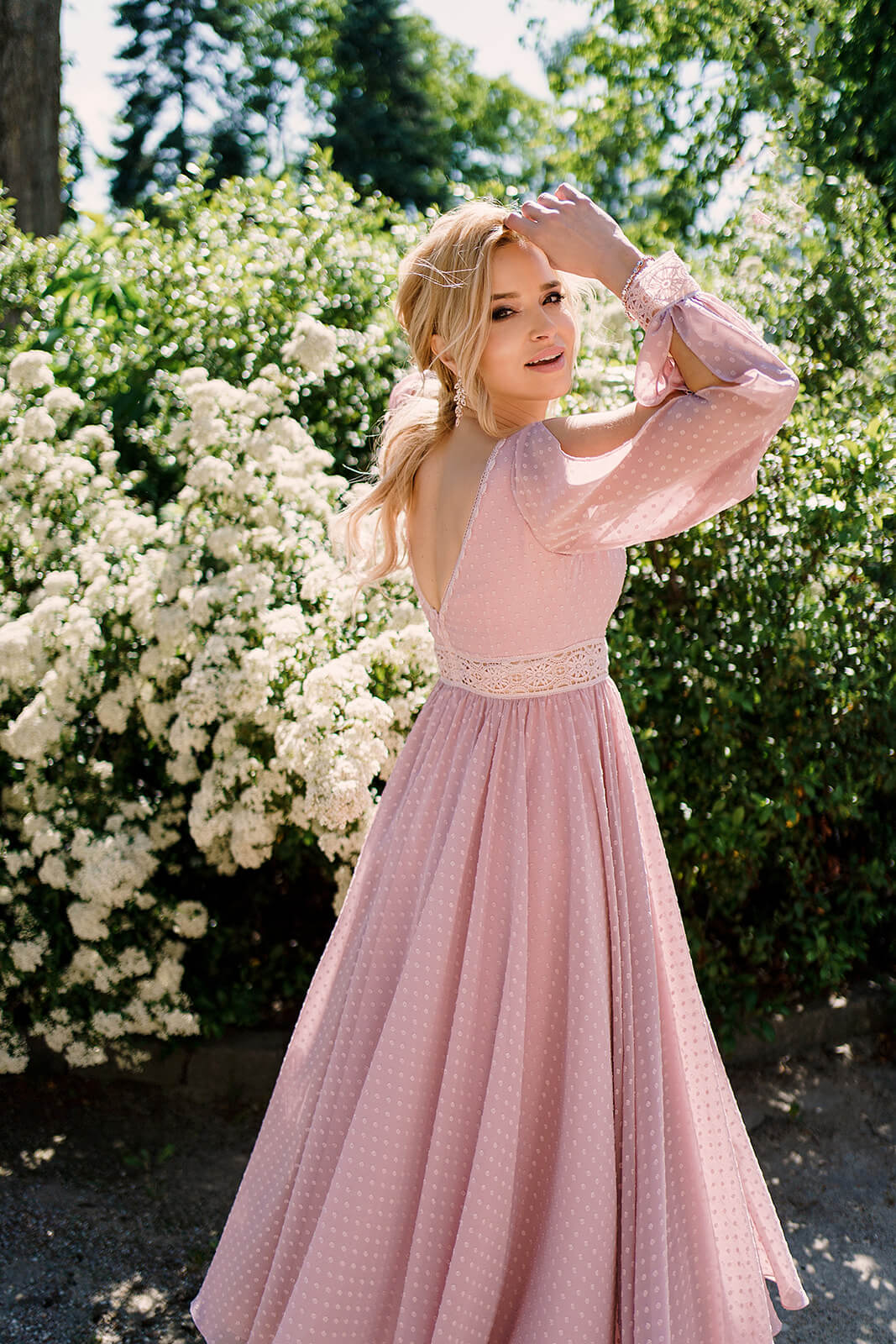 Dotty – short evening dress in motion.